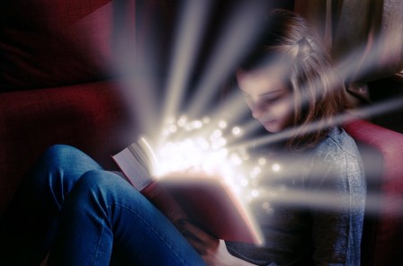 girl reading magic book